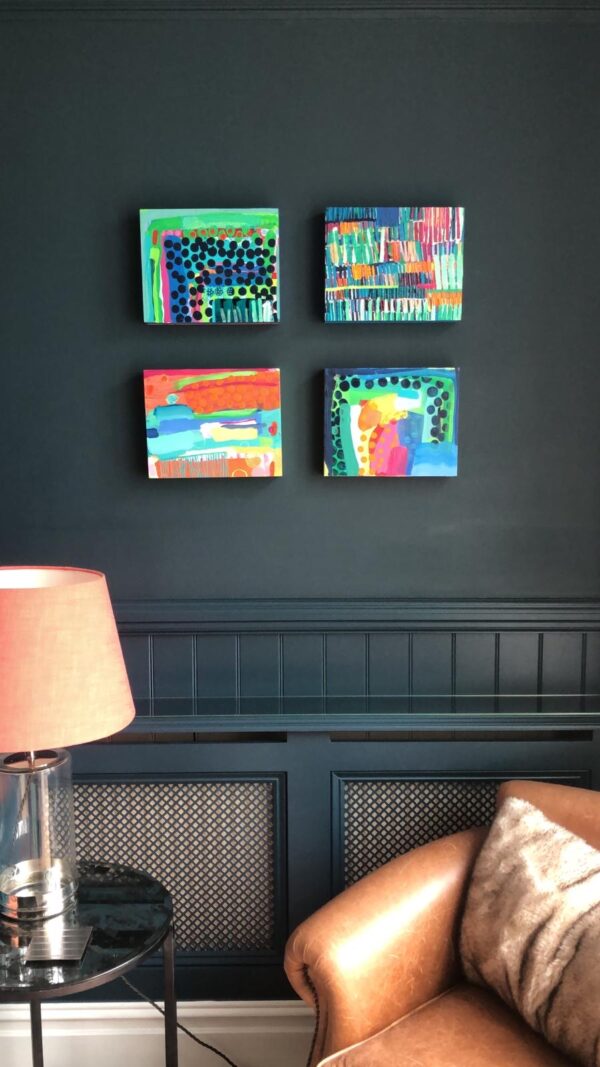 Bright abstract work sourced by Louisa Warfield Art Consultancy for a client with dark walls